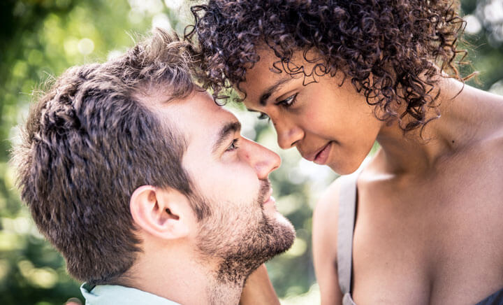 Happy smiling couple in park